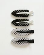 Care HairClips sektioneringsklemmer i sæt af fire, sort duckbill-design